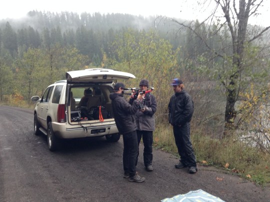 Crew readying the drone-copter with the camera.